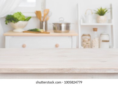 Table Top And Defocused Kitchen Interior As Background