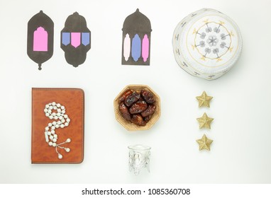 Table Top View Aerial Image Of Decoration Ramadan Kareem Holiday Background.Flat Lay Date In Wood Basket With White Rosary & Lighting.The Holy Book Of Koran On Modern Rustic White Wood At Office Desk.