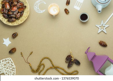 Table Top View Aerial Image Of Decoration Ramadan Kareem Holiday Background.Flat Lay Date With Rosary & Lighting And Cup Of Tea.Essential Object On Modern Rustic Brown Wooden At Office Desk.copy Space