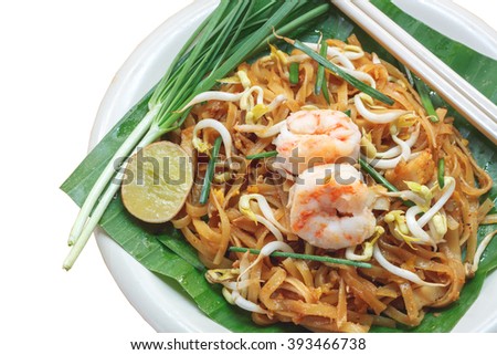 Table top view aerial image Thai food background concept.Flat lay Isolated Thai noodle or padthai,garnish,vegetable,shrimp on white background.Free space for creative design content & font.