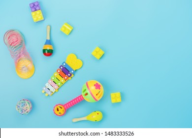 Table Top View Decoration Kid Toys For Develop Background Concept.Flat Lay Accessories Baby To Play With Items Child On Modern Blue Paper At Office Desk.Copy Space For Add Text.pastel Tone Wallpaper.