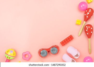 Table Top View Decoration Kid Toys For Develop Background Concept.Flat Lay Accessories Baby To Play With Items Child On Modern Pink Paper At Office Desk.Copy Space For Add Text.pastel Tone Wallpaper.