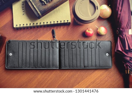 Table top view with purce and notebook