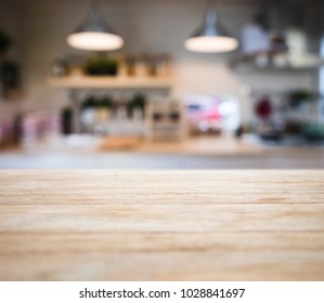 Table Top Wooden Counter Blur Kitchen Pantry With Shelf And Lighting Background 