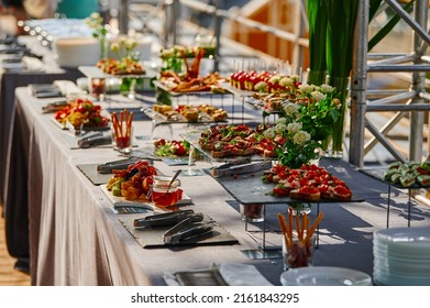 A Table With A Variety Of Treats At An Outdoor Feast, Cold Appetizers For An Event With Catering