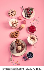 Table with various cookies, donuts, cakes, cheesecakes and coffee cups  on pink background.  Delicious dessert table. Top view, flat lay - Shutterstock ID 2232774531