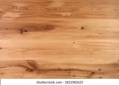 Table Wooden Surface From Natural Beech. Rich Wood Grain Texture Background With Knots And Strong Lines. Copy Space