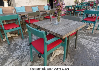 Tables and chairs in cafe or restaurants, outside - Shutterstock ID 1069811501