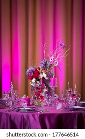 Tables, Chairs, Decor, And Decorations At A Wedding Reception At An Indoor Venue