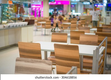 Tables And Chairs On Food Court In Huge Mall