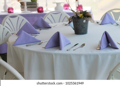 Tables And Chairs At An Outdoor Dinner Event. 