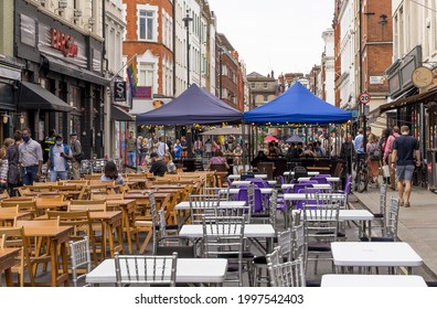 Tables And Chairs For Outside Dining And Drinking In The Cafes And Bars Of Soho In The Daytime. London - 26th June 2021