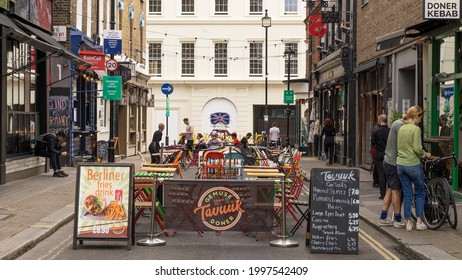 Tables And Chairs For Outside Dining And Drinking In The Cafes And Bars Of Soho In The Daytime. London - 26th June 2021