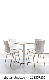 tables and chairs set on floor isolated on white background