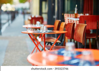 Tables of traditional outdoor French cafe in Paris