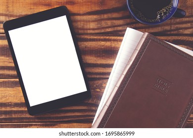 Tablet With A Bible For LIve Streaming Church Services Or Bible Study