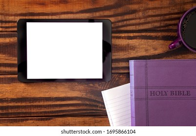 Tablet With A Bible For LIve Streaming Church Services Or Bible Study