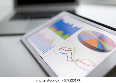 Tablet with business statistic chart