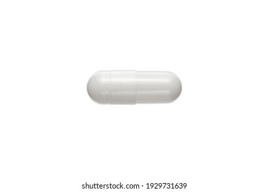 Tablet in capsule. Capsule pill on white background - Shutterstock ID 1929731639