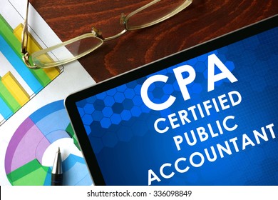 Tablet with certified public accountant (CPA) on a table. Business concept.