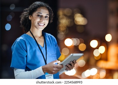 Tablet, city and portrait of a doctor working at night on the rooftop of the hospital building in city. Medical, lights and woman healthcare worker working late on mobile device on balcony of clinic. - Powered by Shutterstock