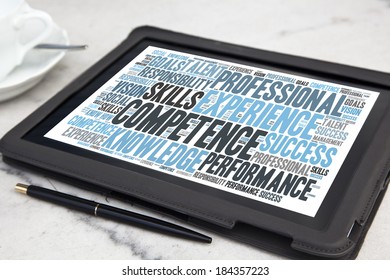 tablet with competence word cloud