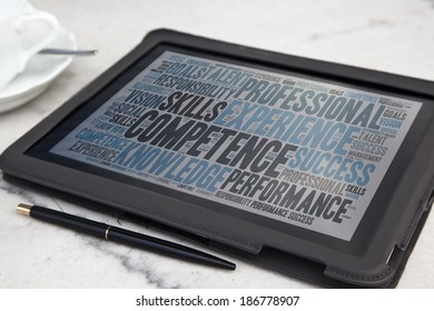 tablet with competence word cloud