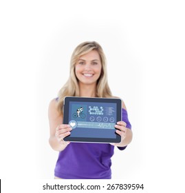 Tablet computer being held by a blonde woman against fitness interface