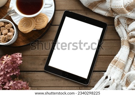 Tablet computer blank screen, digital advertisement or book cover mock