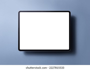 Tablet computer with blank screen isolated on color background