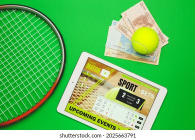 Tablet Computer, Money And Tennis Rocket On Color Background. Concept Of Sports Bet