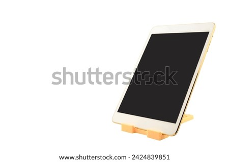 Tablet computer on stand with blank screen, studio shot isolated on white background, modern technology digital portable information device mockup on white background