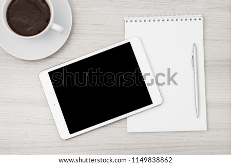 Tablet computer on the white table