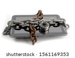 a tablet computer pad with two chains and combination lock wrapped around it isolated on white