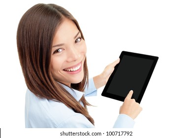 Tablet computer. Woman using digital tablet computer PC happy isolated on white background. Focus on both tablet and face. Beautiful mixed race Asian / Caucasian woman in business shirt. - Powered by Shutterstock