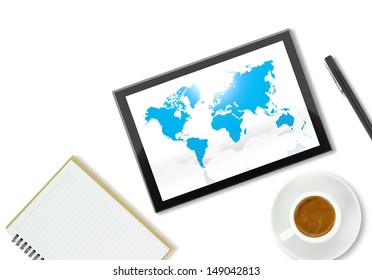 Tablet computer with world map, notebook and a cup of coffee 