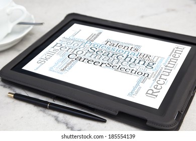 tablet with consulting word cloud
