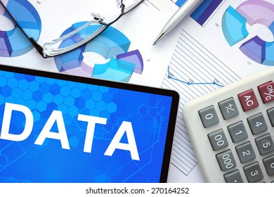 Tablet with  DATA, graphs and calculator.  - Powered by Shutterstock - Get 15% off with code: PIKWIZARD15