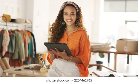 Tablet, design and shipping an online order with woman sending a package using the internet from her office. Creative, technology and logistics with a female entrepreneur at work in her studio - Shutterstock ID 2254461765