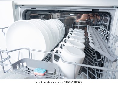 A Tablet Of A Detergent For Washing Dishes In Dishwashing Machine