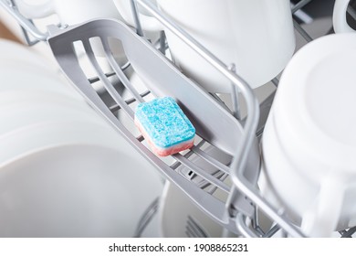 A Tablet Of A Detergent For Washing Dishes In Dishwashing Machine. Soap Tablet