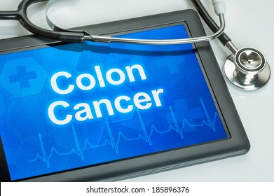Tablet with the diagnosis colon cancer on the display