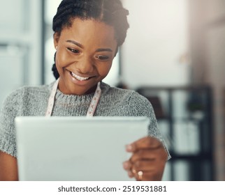 Tablet, fashion designer and black woman in workshop for creative planning with startup business. Digital technology, art and happy female tailor with online sketch for clothing apparel in Nigeria. - Powered by Shutterstock