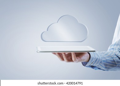 Tablet in hand with symbols - Shutterstock ID 420014791