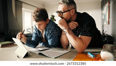 Tablet, homework and math with father and son in kitchen for learning app, education or teaching. Growth, online school schedule and support with man and kid in family home for reading and tutor