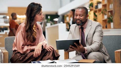 Tablet, hotel lobby and business people with planning, discussion and meeting for conference or seminar. Man, woman and digital contract for b2b, partnership and work trip for hospitality and talk - Powered by Shutterstock