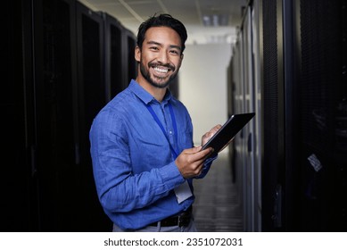 Tablet, man and portrait in server room of engineer programming at night. Information technology, face and happy Asian technician in data center, networking and coding software of system admin expert - Powered by Shutterstock