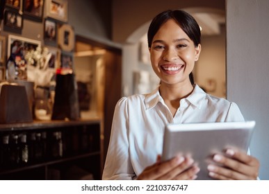 Tablet, Management And Coffee Shop With A Woman Small Business Owner Or Entrepreneur Working In Her Cafe. Portrait, Vision And Technology With A Female Employee Using The Internet In Her Restaurant