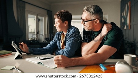 Tablet, math and help with father and son in kitchen for learning app, education or teaching. Growth, online school schedule and support with man and kid in family home for reading and homework