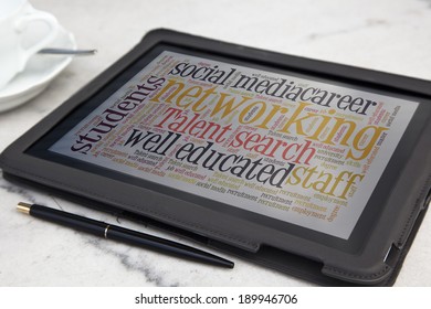 tablet with networking word cloud